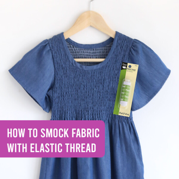 Blue chambray dress with smocked top on a wood hanger and elastic thread with title: How to smock fabric with elastic thread