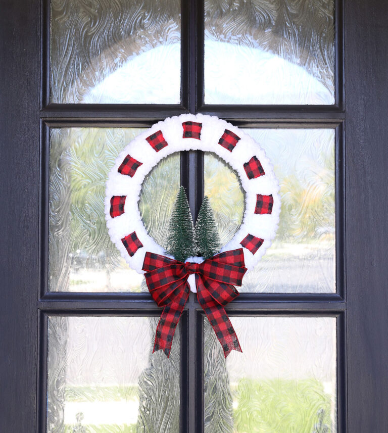 yarn and woven ribbon wreath