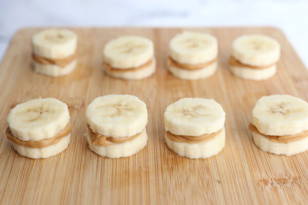 Banana slices sandwiched with peanut butter.