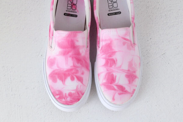 Pink marble tie dyed shoes.